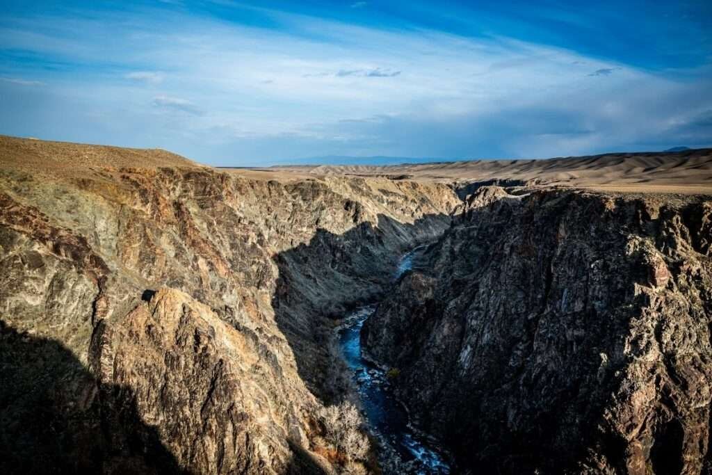 Black Canyon, also known as Lunar or Moon Canyon, is a stunning natural landmark located within Charyn Canyon in Kazakhstan.