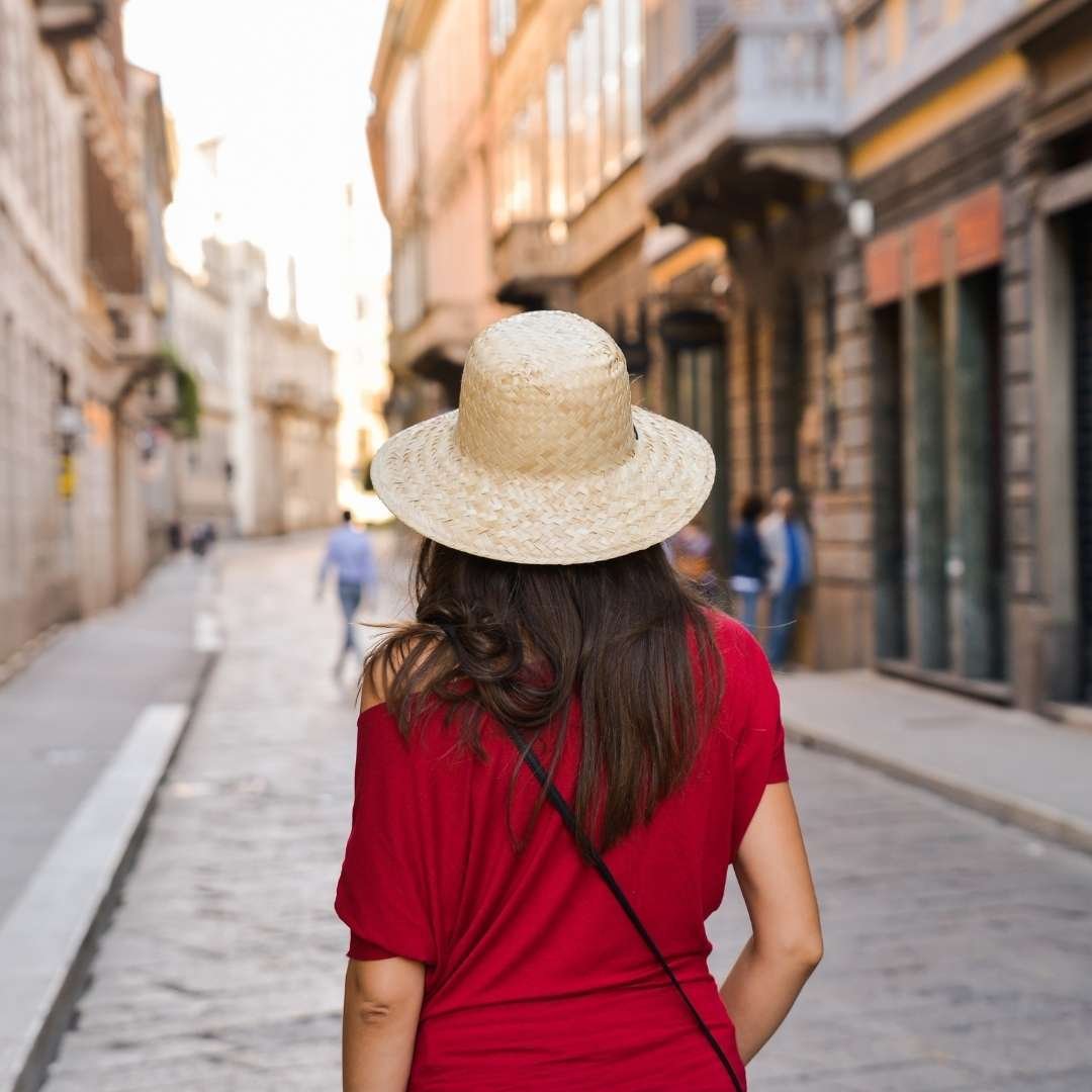 Girl walking in street of Italy